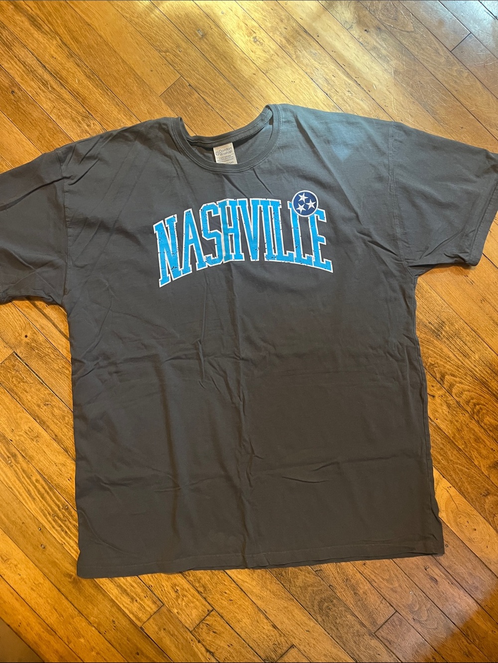 Nashville Graphic Tee in Dark Charcoal Gray/Black with Blue Text